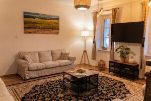 Héregi Harangszó Vendégházak, szállás, apartman, természetközeli, erdő, dézsafürdő, hangulat apartman, nappali, közösségi tér,